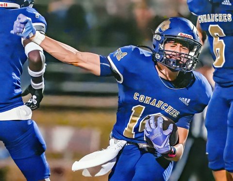 Try as he might, Shiner junior Jake Simper is unable to contain his enthusiasm for his interception of a Falls City pass Friday in Shiner’s 21-3 win. Photo courtesy of Howard Esse