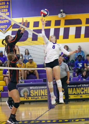Paisly Wallace with a play at the net against Schulenburg on Oct. 15. She had three digs, two aces and a kill to add to her 41 assists. Photo courtesy of Photos by Lori Raabe.