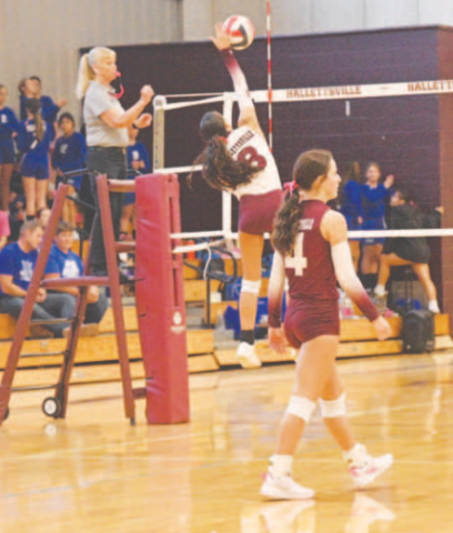 Kasey Harper on the attack in the third set vs. Yoakum here Friday. Chuck Grafe/ Tribune-Herald