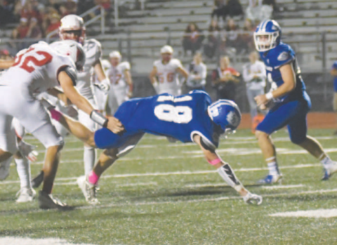 Halfback Clayton Haas scores on a 2-yard run in the third quarter. Chuck Grafe/Tribune-Herald
