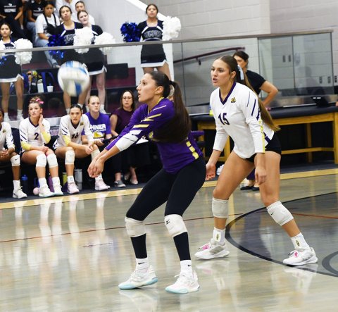 Kylynn Ramirez receives a Mumford serve during action in the second set Thursday against Mumford in Fayetteville. Photo by Mark Lube.