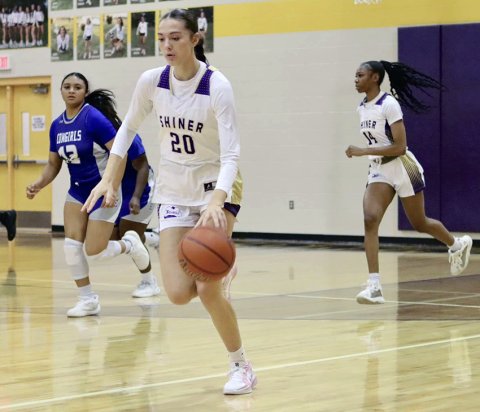 Morgan Lenehan dribbles down court in the Lady Comanches win over Edna on Saturday. She led all scorers with 22 points. Photo courtesy of Louann Heinsohn.