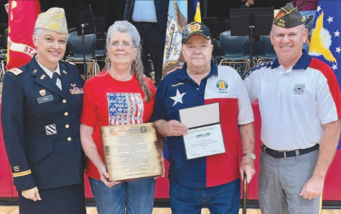 After 60 years, Shiner veteran Klaus David Schlamb received his high school diploma. From left are presenter Jeannie Koch, wife Carolyn Schlamb, David Schlamb and Anthony Fikac.