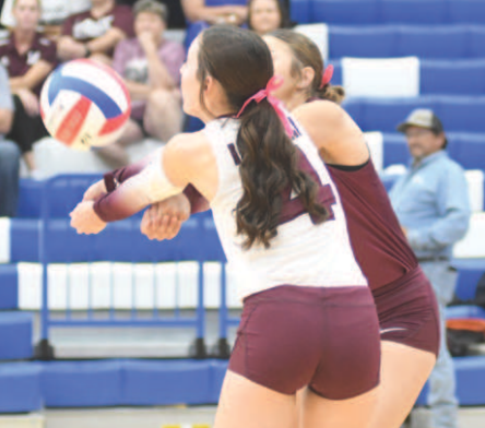 Hanna Zachary, foreground, and Addison Matula converge on the ball. Chuck Grafe/Tribune-Herald