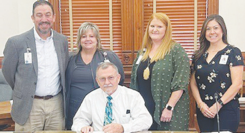 The DeWitt County Commissioners Court made a proclamation designating November as National Hospice and Palliative Care Month. Pictured from left to right are Michael Chavez, Jennifer Nichols, Judge Daryl Fowler, Melissa Cowey, and Pamela Gossett.