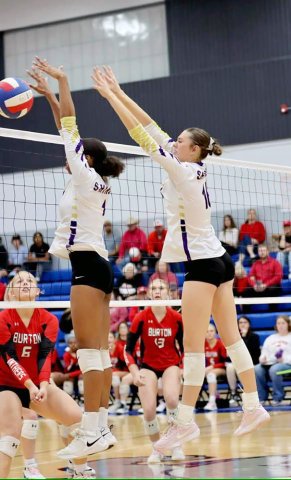 JaMya Wright (left) and Morgan Lenehan attempt a block during the regional final match against Burton on Thursday.