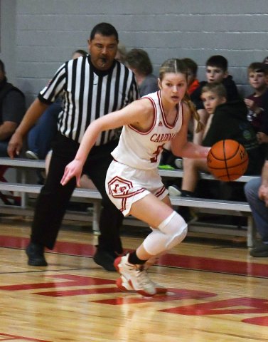 Skylar Mozisek dribbles the ball against Runge. She scored 13 points. Photo by Mark Lube.