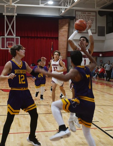 Andrew Nunez jumps up for a shot in the first half Dec. 10 against Runge. Photo by Mark Lube.