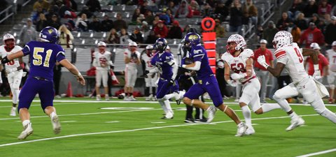 Offensive lineman Jacob Nerada (51) helps to block for running back Clayton Fric on a big gain for Fric. Also in the vicinity is receiver Jarvis Williams (3). Shiner rushed for over 400 yards against Bremond in a 41-33 win Thursday night in Cypress. Photo by Mark Lube.