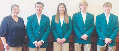 The 4H ambassadors spoke about its activities within the past quarter. Pictured from left to right are DeWitt County Extension Agent Candace Williamson and Ambassadors Gunnar Frank, Ella Jander, Andrew Hahn, and Caleb Keller.