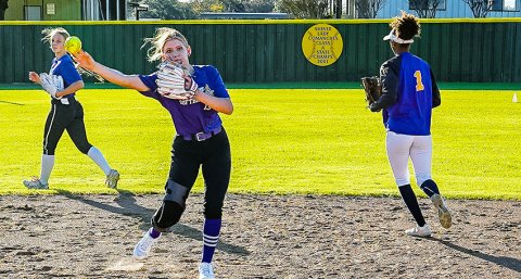 Lauren Springfield (center) and a couple of teammates go through a practice session. Photo courtesy of Howard Esse.