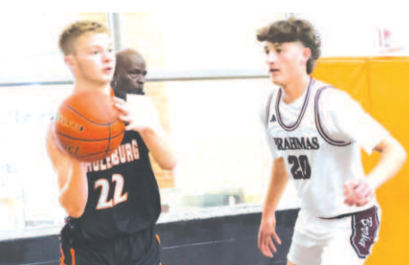 Weston Loudon guards Schulenburg’s Cade Herzik. Chuck Grafe/Tribune-Herald