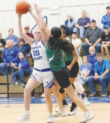 Ashton Schaefer looks to make an outlet pass during the victory here Friday. Chuck Grafe/Tribune-Herald