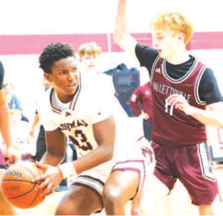 Shane Migura guards Industrial’s Holden McMullen. Chuck Grafe/Tribune-Herald