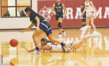 Addison Matula dives for a lose ball vs. Yoakum. Chuck Grafe/Tribune-Herald