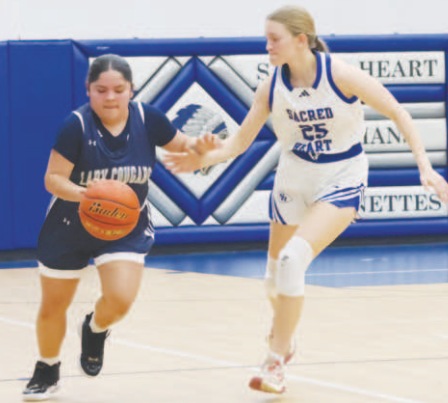 Catherine Lemonds on defence in the VFA win. Chuck Grafe/Tribune-Herald