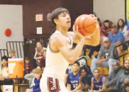 Gavyn Chapa shoots a three against Yoakum. Chuck Grafe/Tribune-Herald