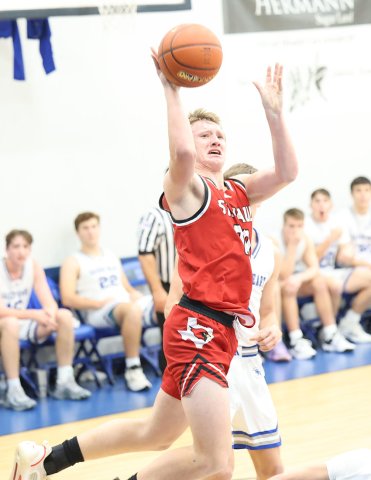 Carter Chilek puts up a shot Feb. 4 at Sacred Heart. Photo courtesy of Chuck Grafe/Hallettsville Tribune-Herald.