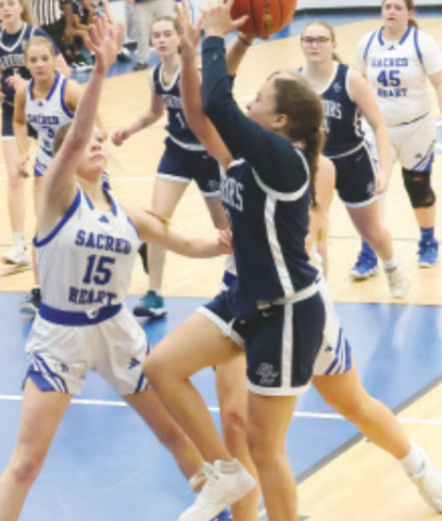 Allie Clark on defense against Bracken Christian.. Chuck Grafe/Tribune-Herald