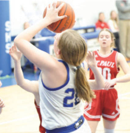 Ashton Schaefer right, scores in the third quarter. Chuck Grafe/Tribune-Herald