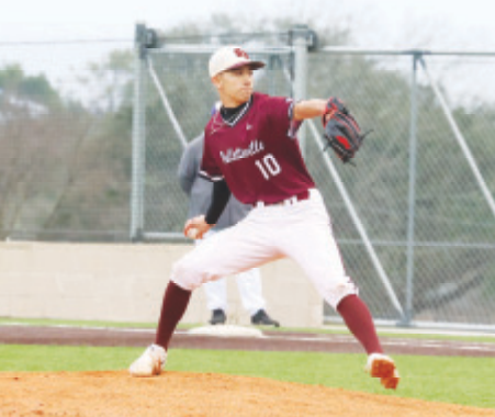Hudson Chenard throws the first pitch of the season vs. Shiner. Chuck Grafe/ Tribune-Herald