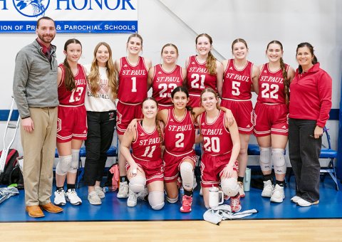 St. Paul Lady Cardinals Division V-District 2 champions.  Front row from left are Annie Werner, Nora Koch and Kristin Cerny. Back row from left are head coach Max Bergkamp, Reese Chilek, Sloane Kocian, Riley Mozisek, Jenna Stock, Addy Matias, Skylar Mozisek, Faith Brown and assistant coach Nicco Brown. Photo courtesy of Photos by Lori Raabe.