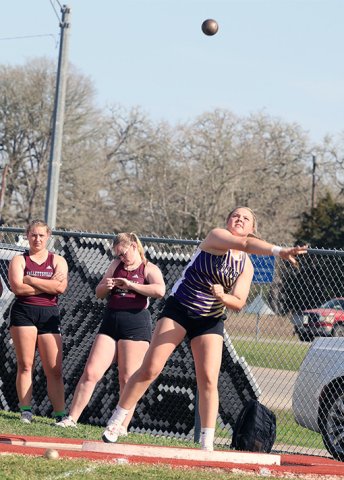 Kailey Boedeker chunks the shot put. She placed second with 108 feet, 8 inches. Photo courtesy of Chuck Grafe/Hallettsville Tribune-Herald.