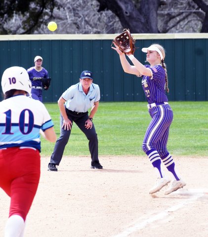 First baseman Cami Cowan waits on a pass for a putout as against Tidehaven as the batter approaches Photo by Mark Lube. 