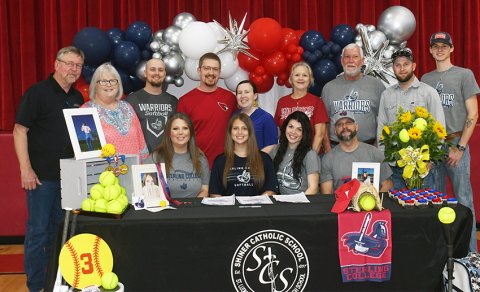 St. Paul senior softball player Alyssa Jasek signed with Sterling College (Sterling, Kan) in a ceremony on Friday. Seated from left is Johnna Jasek, Alyssa Jasek, Alexis Jasek and Bryon Jasek. Standing from left are John Klapuch, Berny Klapuch, Dillon Lambert, Adam Klapuch, Melissa Klapuch, Mimi Richter, Allen Jasek, Gaven Jasek and Cole Kubicek. Photo by Mark Lube.