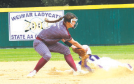 LB shortstop Macey Pustka tags out Navarro’s Sarah Bailer in Thursday’s game. Chuck Grafe/Tribune-Herald