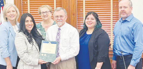 A Certificate of Achievement was given to County Auditor Neomi Williams for excellence in financial reporting. Pictured from left to right are members of the Auditor's Office Melissa Terry, County Auditor Neomi Williams, Candy Frady, Judge Daryl Fowler, Cindy Maurer, and Michael Dietzel.