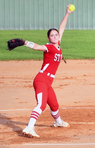 Tatum Walker winds up for a pitch against San Antonio Lutheran Friday evening at the Shiner Starplex. She had nine strikeouts. Photo by Mark Lube.