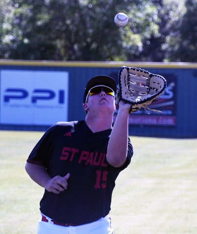 First baseman Brodey Biehunko sees a fly ball drop into his glove in game one. Photo by Mark Lube.