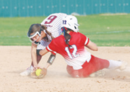 Macey Pustka could not get the tag down on time but the Lady Brahmas had the last laugh with a 5-4 victory here Tuesday, March 25. Chuck Grafe photo
