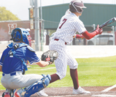 Andrew George squares around to bunt in Saturday’s game. Chuck Grafe photo