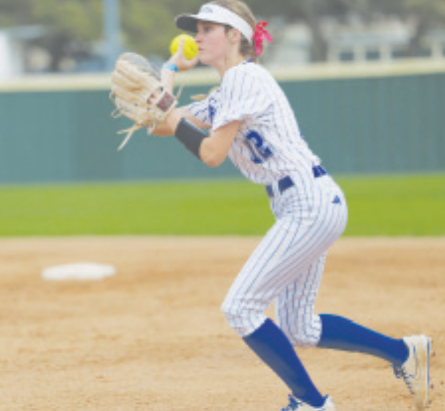 Indianette second baseman Madelyn Kurtz throws out a runner at first. Photo by Chuck Grafe