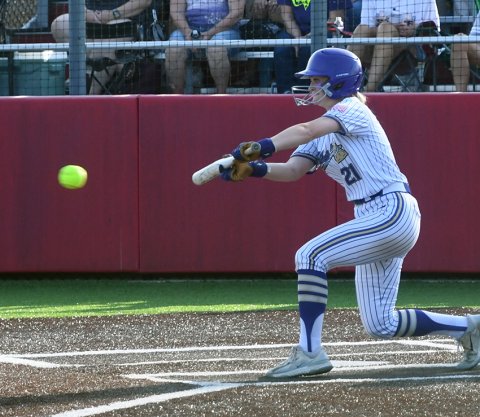 Cami Cowan attempts a bunt in the bottom of the second inning Thursday in the first game. She moved Reagan Fluitt to second on the sacrifice and finished 1-for-3. Photo by Mark Lube.