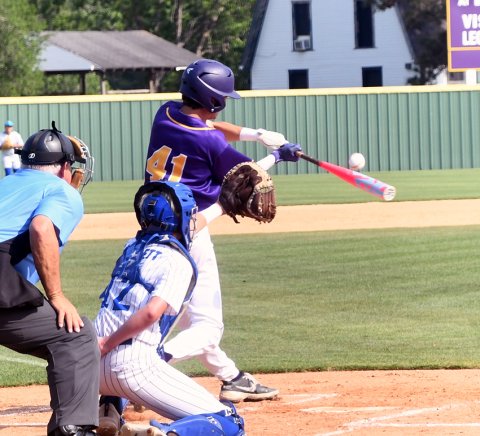 Carson Schuette bats in the first inning of the opener. He went 3-for-3, scored three runs, had four RBI and had three stolen bases. Photo by Mark Lube.