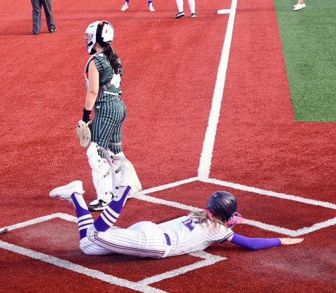 Addy Siegel scores the first Shiner run in the 11-0 win on May 21.  She scored twice in the game. Photo by Mark Lube. 