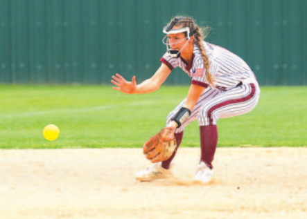 Lady Brahmas shortstop Macey Pustka scoops up a ground ball.. Photo by Chuck Grafe
