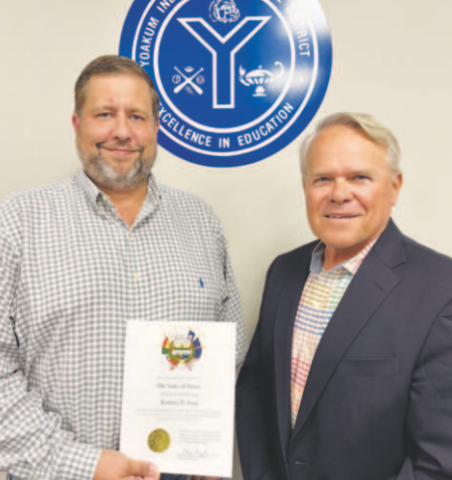 Rodney Svec took the administrator Oath of Office at the May 12 Yoakum ISD School Board meeting. Pictured from left to right are Svec and Yoakum ISD School Board President Glen Kusak