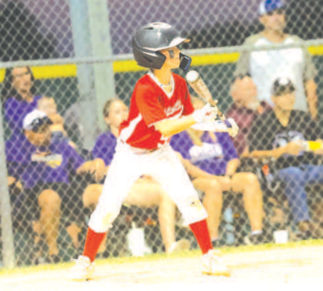 Photo by Chuck Grafe Blake Cliffe attempts a bunt in the victory over Shiner. 