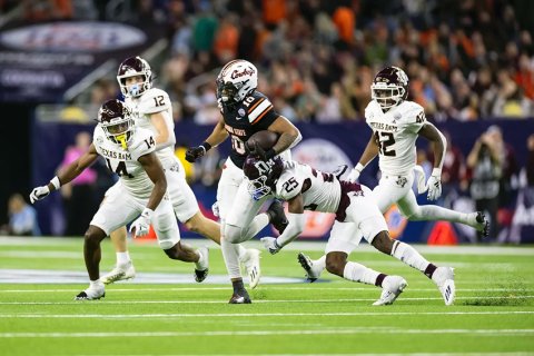 Shiner graduate and Texas A&M defensive back Dalton Brooks (25) attempts to make a stop during the 2023 Texas Bowl against Oklahoma State during his freshman season. Brooks played every game in his sophomore year in 2024 for the Aggies. Photo courtesy of Craig Bisacre/Texas A&M Athletics.