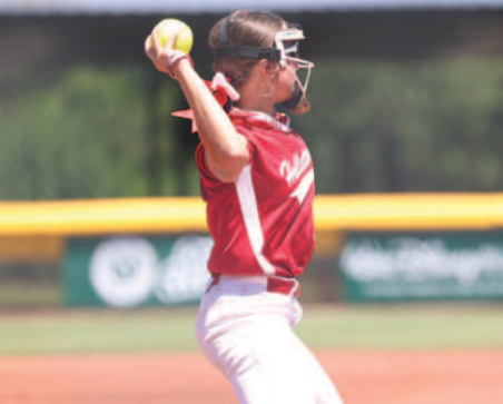 Photo by Chuck Grafe Landry Whitley makes a throw to first in the Thursday game..