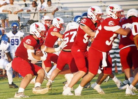 -Sam Perez follows the Cardinal offensive line during a first-quarter carry. He ran for 170 yards and one touchdown. Photo by Mark Lube.