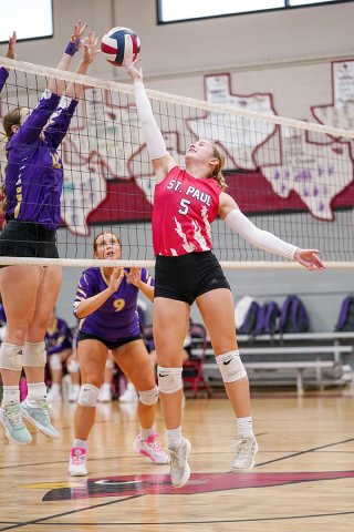 Shiner’s Harlee Sevcik (left) tries to block the attack of St. Paul player Skylar Mozisek Sept. 9 during Shiner’s 3-1 win at St. Paul. Photo courtesy of Photos by Lori Raabe.