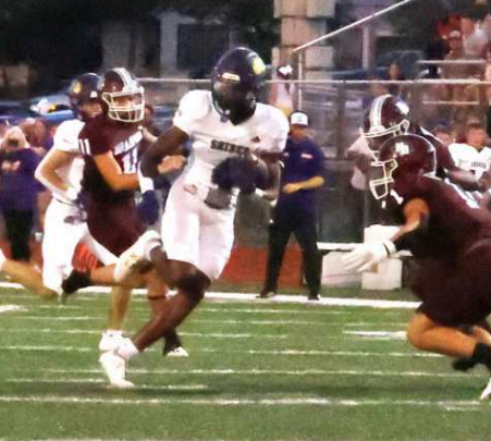 Photo by Chuck Grafe Peyton Willis (1) closes in to make a tackle on Shiner’s Quincy Jones