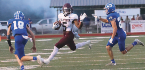 Photo by Chuck Grafe Trent Sevcik (19) closes in to make the tackle on Flatonia’s Koren Scott (5).