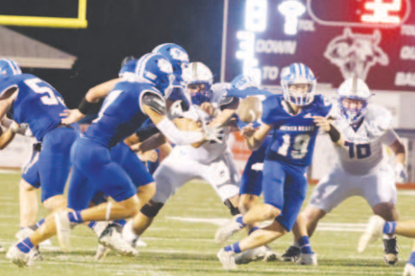 Photo by Chuck Grafe Quarterback Trent Sevcik (19) scored both Indian touchdowns in the loss to St. Joseph.
