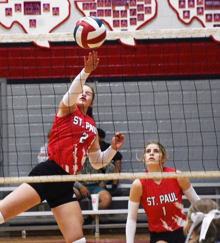 Annabelle Collins makes a play at the net in the second set against Victoria Faith Academy on Thursday. Photo by Mark Lube.